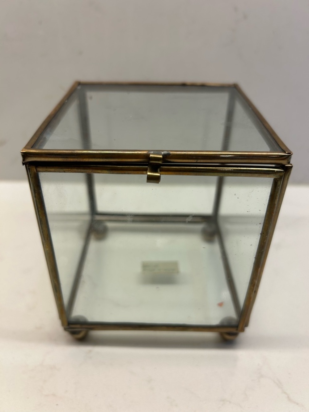 Vintage Glass Display Jewelry Box with Brass Frame and small ball feet .